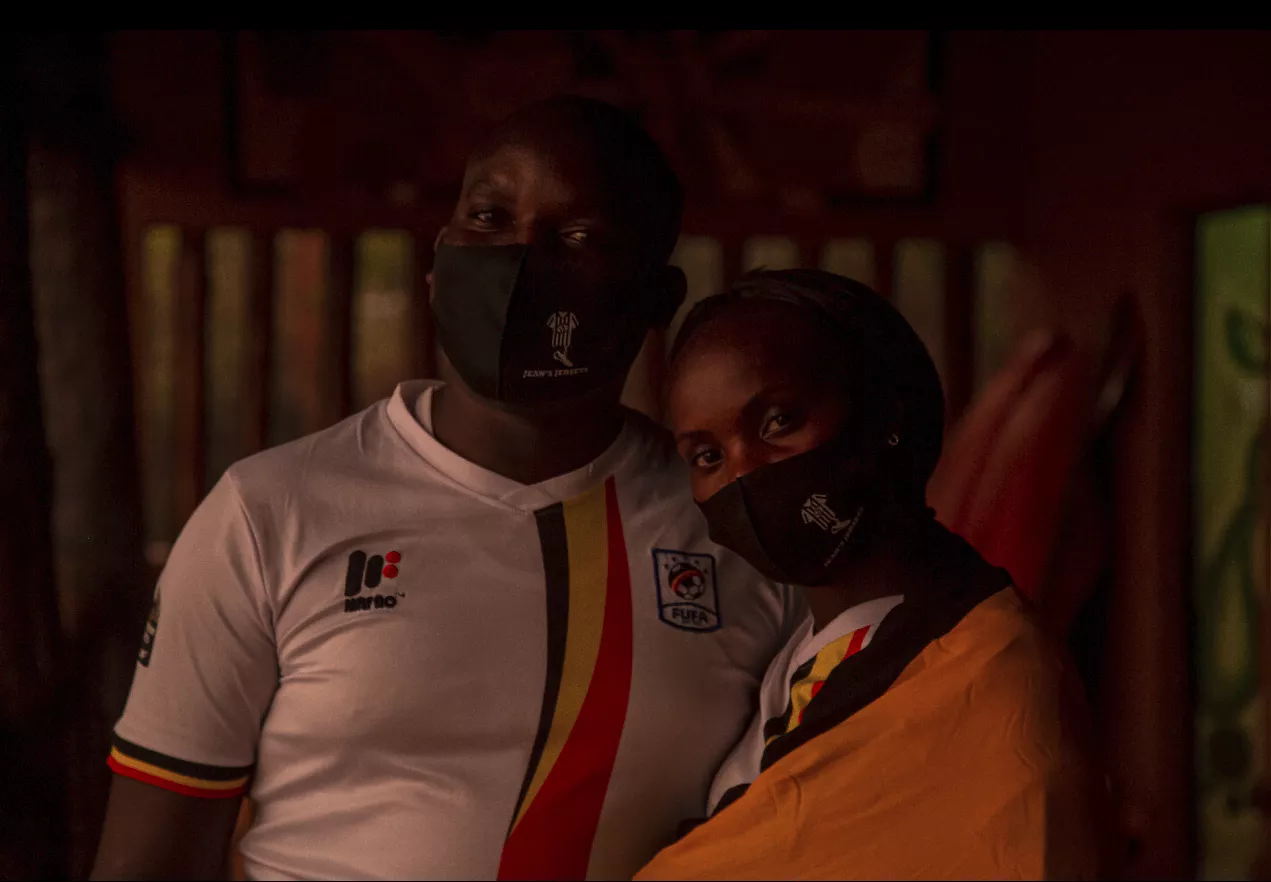 Uganda White COuple with flag